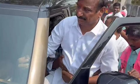 BRS MP Kotha Prabhakar Reddy getting into his car after being stabbed. (Video grab)