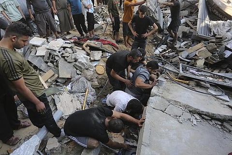 Palestinians look for survivors after an Israeli strike in Rafah, Gaza Strip, Tuesday, Oct. 31, 2023. (Photo | AP)