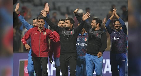 Afghanistan's players acknowledge the crowd after winning their match against Sri Lanka in Pune on Monday | AP