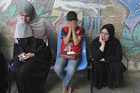 Palestinians mourn relatives killed in the Israeli bombardment of the Gaza Strip in Rafah, Monday, Oct 30, 2023. (Photo | AP)