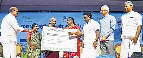 AIADMK MLAs sharing the dais with union finance minister Nirmala Sitharaman in Coimbatore on Tuesday | S Senbagapandiyan