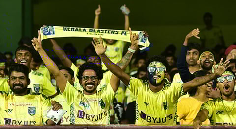 Fans celebrating Kerala Blasters’ victory against Jamshedpur FC during the ISL football match at JLN Stadium. (Photo | A Sanesh)