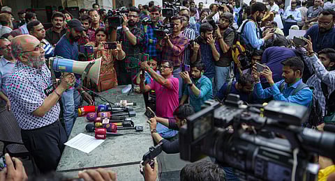 Senior journalist Paranjoy Guha Thakurta speaks during a protest organised by journalists over Police actions on news portal NewsClick, at Press Club of India in New Delhi. (Photo | PTI)