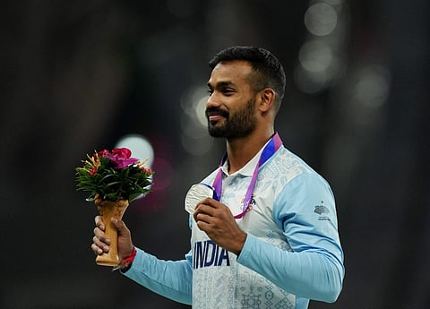 Silver medalist India's Kishore Kumar Jena during the presentation ceremony of the Men's Javelin Throw Final event at the 19th Asian Games in Hangzhou, China. (Photo | PTI)