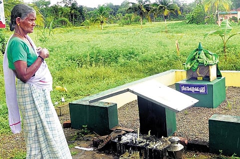 An elderly woman praying at the Kayamkulam Kochunni temple at Edappara near Kozhencherry | SHAJI VETTIPURAM