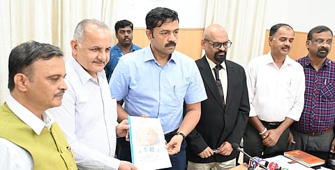 BBMP Special Commissioner for Health Dr KV Trilok Chandra releases a survey of dogs under the Palike’s jurisdications on Wednesday. (Photo | Nagaraja Gadekal)