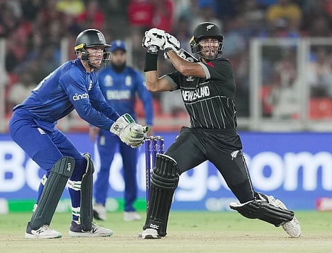 New Zealand batter Rachin Ravindra plays a shot during the World Cup match against England (Photo | PTI)