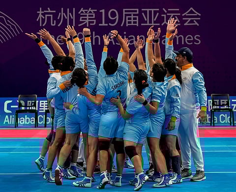 Indian players celebrate winning the women's kabaddi semifinal match against Nepal at the 19th Asian Games, in Hangzhou, China. (Photo | PTI)