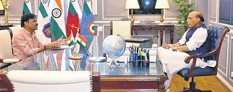 BJP MP GVL Narasimha Rao with Defence Minister Rajnath Singh in Delhi I Express