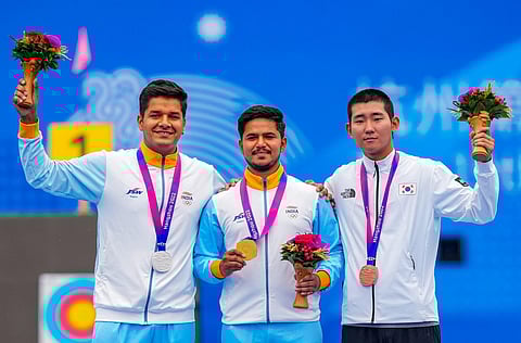 Gold medalist India's Ojas Pravin Deotale, silver medalist compatriot Abhishek Verma and bronze medalist Korea's Yang Jaewon. (Photo | PTI)