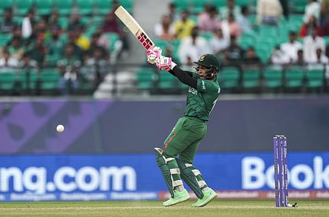 Bangladesh's Mushfiqur Rahim plays a shot during the World Cup match against Afghanistan in Dharamsala (Photo | AP)