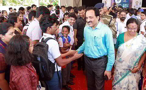 ISRO chairman S Somanath interacts with school students at Vikram Sarabhai Science School, Kakkanad, Kochi, on Saturday. Indira Rajan, chairperson of VSSF, looks on. (Photo | T P Sooraj)