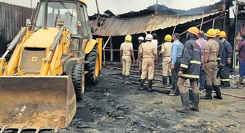 Fire force personnel at the cracker shop at Attibele on Saturday