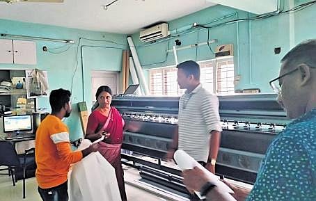Enforcement squad under Suchitwa Mission inspects a printing press as part of a special drive to curb the use of flex boards |b p deepu