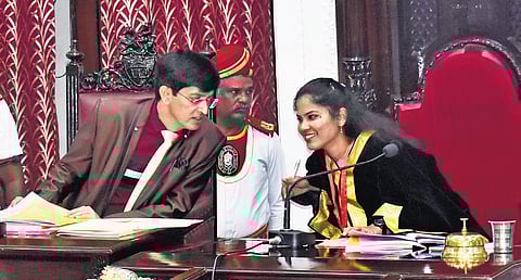 Mayor R Priya sharing a lighter moment with corporation commissioner J Radhakrishnan during the council meet on Tuesday. (Photo | P Jawhar)