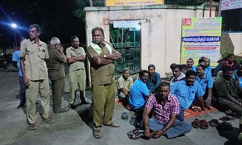 Drivers and conductors staged a dharna protest in front of the TNSTC depot in Perundurai early on Tuesday morning. (Photo | Express)