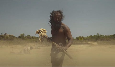 A scene from the teaser of Vikram's Thangalaan.