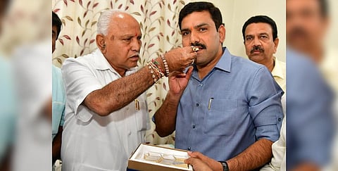 FILE PHOTO | BS Yediyyurappa with his son BY Vijayendra at his residence in Bengaluru (Photo | Express)