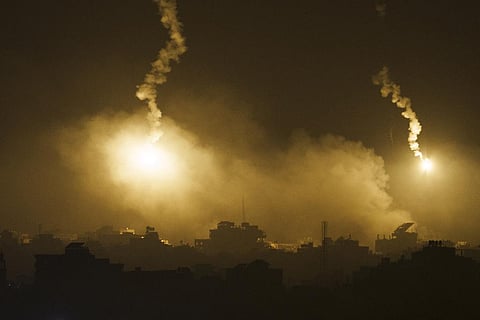Smoke rises following an Israeli airstrike in the Gaza Strip, as seen from southern Israel, Thursday, Nov. 9, 2023.