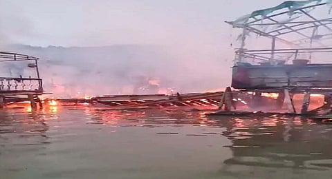 Smoke billows after a fire broke out in the tourist hub of Dal Lake, in Srinagar, early Saturday morning. (Express)