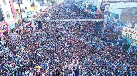 A mammoth crowd turns up to hear Minister T Harish Rao speak in support of Huzurabad BRS candidate Kaushik Reddy on Friday. (Express)