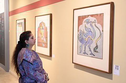 Visitors explore the exhibition showcasing the 77 Haripura Panels at NGMA Bengaluru. (Photo | Nagaraja Gadekal)