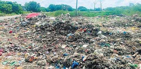 Shortage of sanitation staff means mounds of garbage are an ubiquitous sight in Madhira. ( Express)