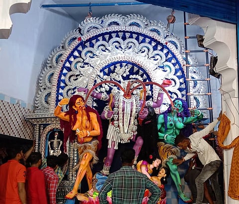 Puja organisers decorating idol of Goddess Chhinnamasta at Bakhrabad in Cuttack on Saturday. (Photo | Express)