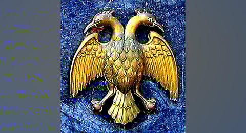 Gold-coated metal badges depicting Gandaberunda. (Photo | Express)