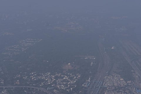 This aerial view shows smog enveloping the skyline on the outskirts of New Delhi. (Photo | AP)