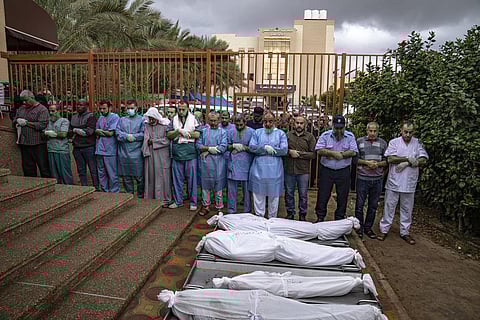 Palestinians mourn their relatives killed in the Israeli bombardment of the Gaza Strip, in the hospital in Khan Younis, Tuesday, Nov. 14, 2023. (Photo | AP)