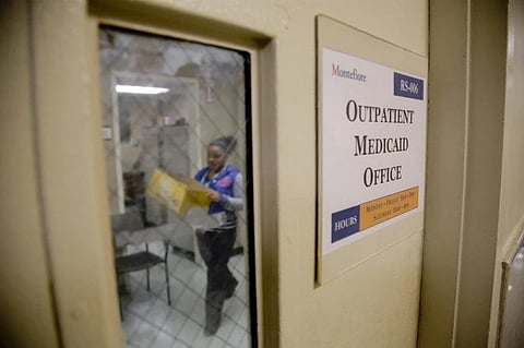 FILE - A Medicaid office employee works on reports at Montefiore Medical Center, Nov. 21, 2014, in New York. (Photo | AP)
