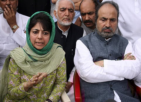 Peoples Democratic Party president Mehbooba Mufti (left) and ex-party patron Muzaffar Hussain Baig. | (File | AP)