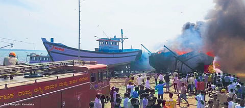 A blaze rips through Gangolli harbour in Udupi, destroying eight big and two small fishing boats on Monday. (Photo | Express)