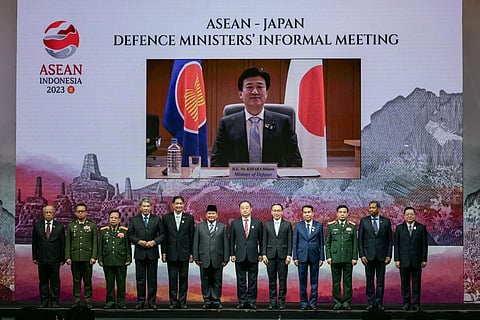 Japan's Defence Minister Minoru Kihara (on screen) participates online with other ministers during the ASEAN-Japan Defence Ministers' Informal Meeting in Jakarta on November 15, 2023. (Photo | AFP)