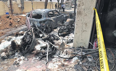 The Telangana Police Clues team conduct investigation at the fire mishap spot at Bazarghat in Nampally in Hyderabad. | Sri Loganathan Velmurugan