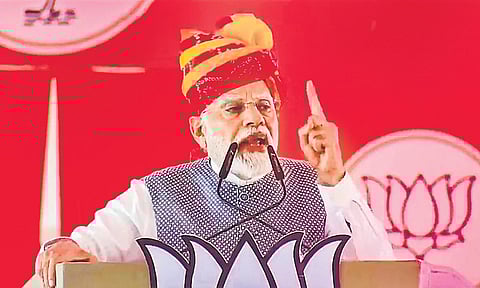 Prime Minister Narendra Modi speaks during a public meeting ahead of Rajasthan Assembly elections, at Baytu in Barmer district, Wednesday, Nov. 15, 2023. (PTI)