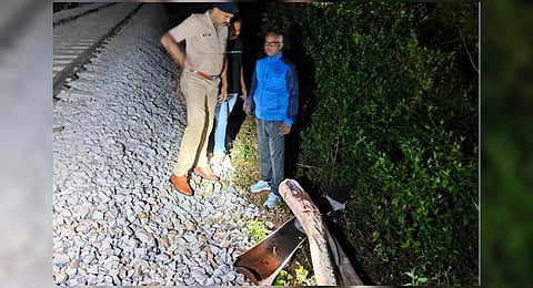 An officer inspects the log that was kept on the track | Express