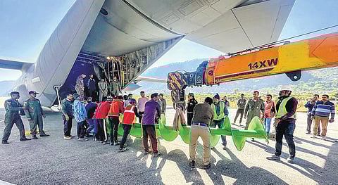 A component of a US auger machine being unloaded from the IAF’s C-130 J aircraft for onward transport to the tunnel collapse site in Uttarakhand on Wednesday | PTI