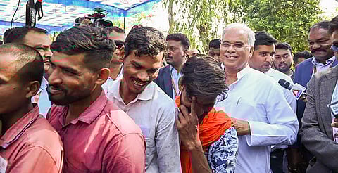 Chhattisgarh Chief Minister Bhupesh Baghel waits to cast his vote for the state Assembly election in his native village Kuruddih (Photo | PTI)