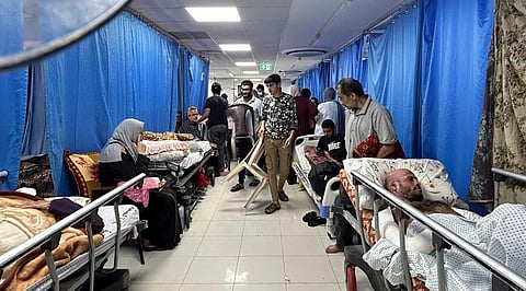 Patients and internally displaced people are pictured at Al-Shifa hospital in Gaza City on November 10, 2023. (File Photo | AFP)