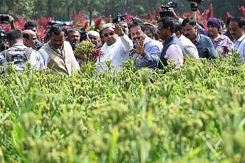 Chief Minister Siddaramaiah waves at people at the launch of Krish Mela-2023 in Bengaluru on Friday. (Photo | Nagaraja Gadekal)
