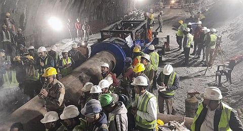 Rescue and relief operations underway after a portion of a tunnel under construction between Silkyara and Dandalgaon collapsed, in Uttarkashi. (Photo | PTI)