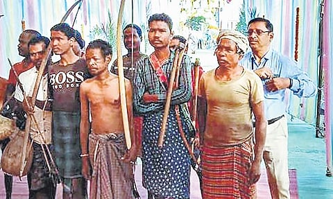 Tribals at Dhamtari district, about 65km from Raipur, arrive to cast votes | pti