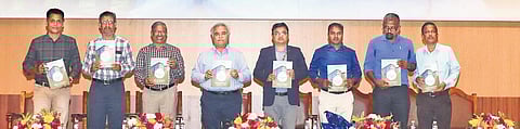 SRM-University AP staff unveiling Abstract Book in Vijayawada on Saturday I Express