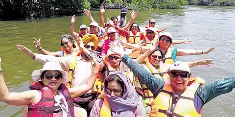Seniors river rafting during a vacation