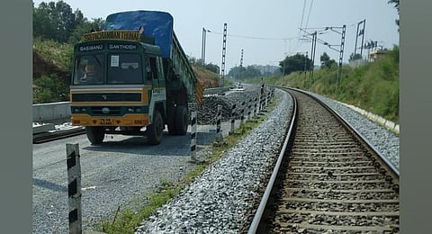 Spreading of ballast underway in connection with doubling between Bellandur Road railway stn and Karmelaram railway stations. (Photo | Express)