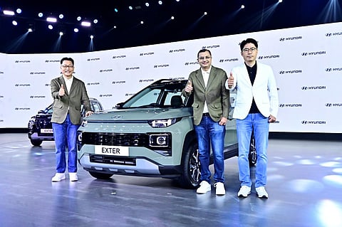 L-R: Unsoo Kim, MD & CEO, Hyundai Motor India; Tarun Garg, COO; J T Park, executive director (sales, marketing & service), at the launch of Hyundai Exter in New Delhi. (PTI)