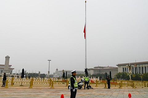 The Chinese national flag flies at half-mast for the passing of former Chinese premier Li Keqiang, at Tiananmen Square in Beijing on November 2, 2023. (Photo | AFP)