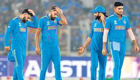 Dejected India players after the loss to Australia in the final of the ODI World Cup in Ahmedabad on Sunday. (Photo | Agencies)
